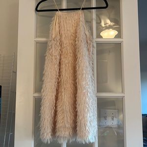 Cream sparkle feather dress.